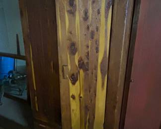 Rustic Wooden Cabinet - This charming rustic wooden cabinet features a natural finish and two doors, perfect for storage or display. Ideal for adding a touch of warmth to any room.