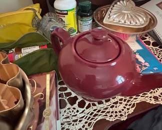 Vintage Burgundy Teapot - Charming vintage burgundy teapot perfect for tea lovers or as a decorative piece.