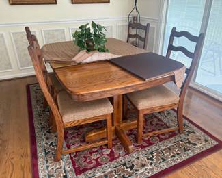 . . . oak dining table and chairs
