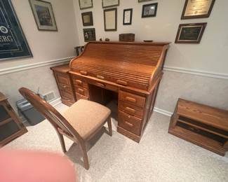 . . . oak roll-top desk with matching file cabinet
