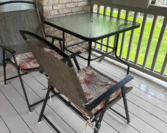 . . . more patio chairs and table