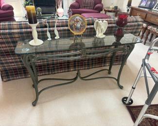 . . . great wrought-iron and glass sofa table
