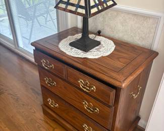 . . . oak cabinet and nice stained-glass accent lamp