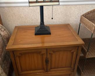 . . . and night stand with stained-glass lamp