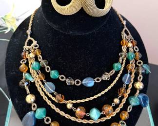 Many pieces of vintage costume jewelry