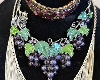 Many pieces of vintage costume jewelry