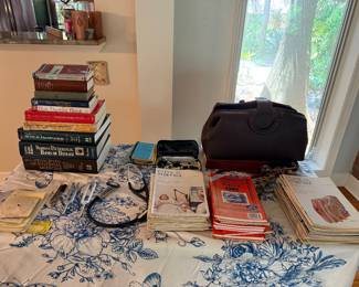 Doctor’s bag, various medical books and items, including vintage