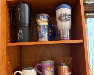 Insulated drink holders and mugs