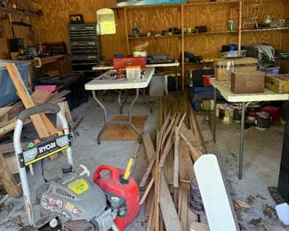Still working in garage by guest house 