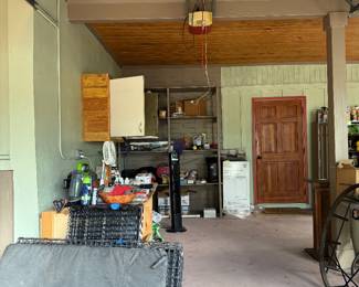 Three dog crates, various tools and cleaners