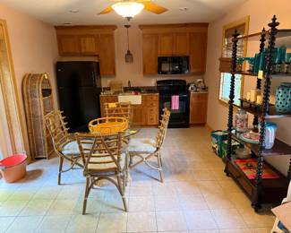 Rattan table & chairs, whatnot etagere shelf, wicker arch shelf, lots of kitchen items