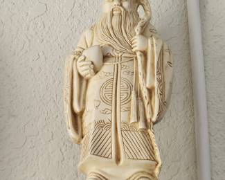 Carved figurine of Shouxing, Chinese God of Longevity. Resin Material.