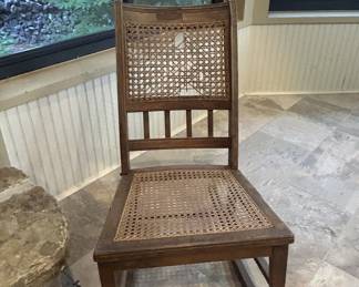 Antique wooden side chair with cane seat and back