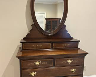 Mahogany dresser with oval mirror, brass pulls, 6 drawers