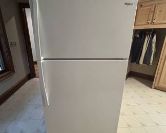 Whirlpool white top-freezer refrigerator, standard size