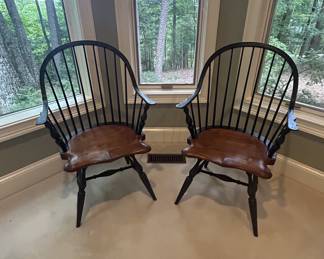 Pair of Windsor bow-back armchairs, black wood, saddle seats