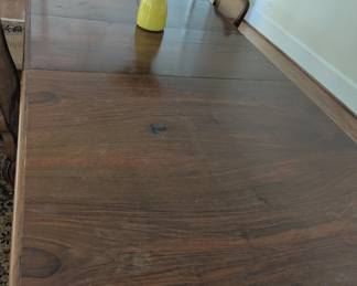 Table is in need of work to bring it back to its original luster