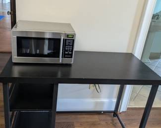 Microwave in working condition for sale also table
