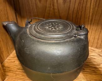 antique cast iron tea kettle, Similar items are identified as originating from manufacturers like J. Savery's & Son or Chattanooga, sometimes dating to the 1800s