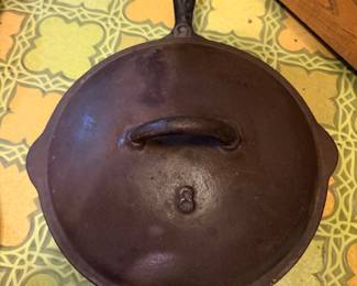 vintage cast iron chicken fryer with a raised number "8" on the lid, often referred to in collector communities as a "Mystery Fryer" due to its unknown maker