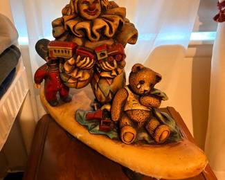 vintage ceramic statue appears to be a "sad clown" themed figurine, similar to those produced by companies like Universal Statuary or Progressive Art Products