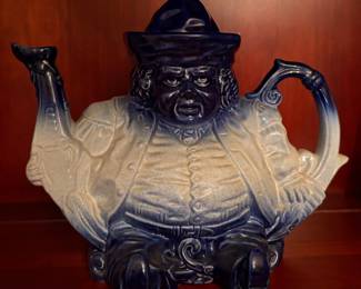 Staffordshire Flow Blue Parliament Judge teapot features a distinctive figural design in a vibrant blue and white transferware finish