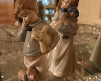 NAO by Lladro "Hello Mommy" porcelain figurine, model #1044, featuring a boy on a phone with a dog, and girl 