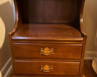 Henkel Harris solid cherry piece featuring a tiered design with two drawers and brass hardware