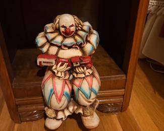 Chalkware sitting clown