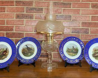 Set of 4 vintage JKW Bavaria decorative plate featuring blue and gold rim.