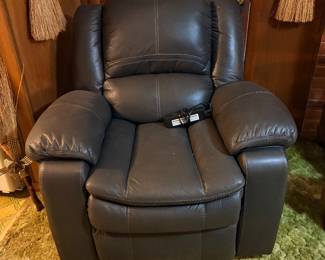 dark gray power rocker recliner by Boyel Living features vibration massage and lumbar heating functionality