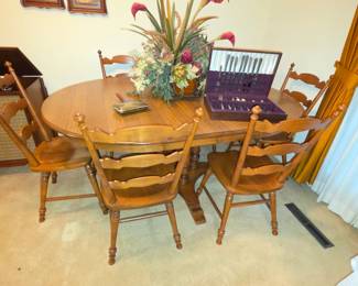 Dining table with 3 leaves and 6 chairs