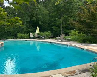 IMAGINE YOURSELF SITTING BY THE POOL AND RELAXING!