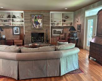 Beautiful floors, Bookcases, and Doors to front porch!