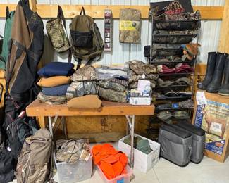 An array of some of the hunting apparel, boots, and bags we have