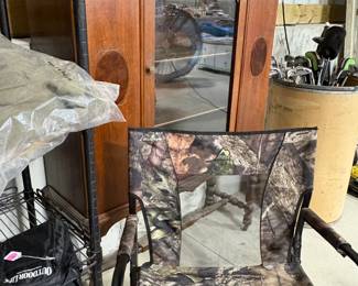 Small antique display cabinet and one of our cammo chairs.