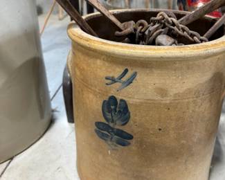 One of several nice crocks holding vintage traps