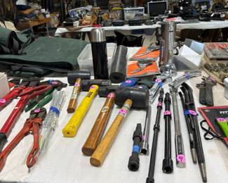 A table full of hand tools