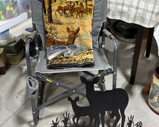 Another outdoor chair and a decorative deer cut-out