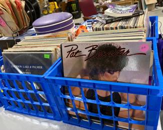 Crates of 60's, 70's, and 80's rock albums.