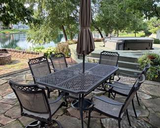 Patio table with 6 chairs and umbrella