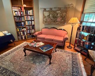 Victorian sofa, Thomasville clawfoot coffee table, wall tapestry, books, OMID wool rug 7'x10.3' (retailed at $6K), TIME collector magazines