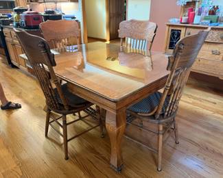 Antique dining room table with 4 chairs