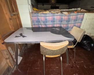 beautiful vintage metal table with formica top.  Great condition
