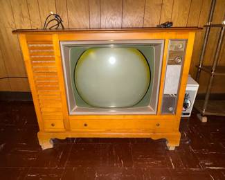 vintage console TV. (remember being the remote for your dad?)