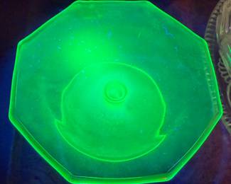 Uranium glass dish, under UV light.