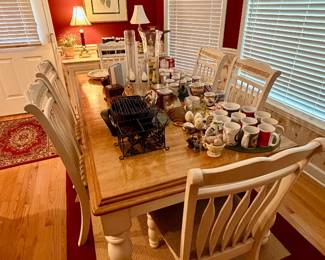 View of kitchen dining table and chairs.