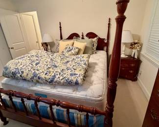 Four post bed and pair of nightstands.