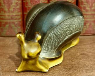 Ceramic snail from Freeman & McFarlin Pottery.