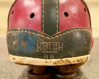 Vintage leather football helmet by Hutch with sheepskin lined interior and leather chin strap.